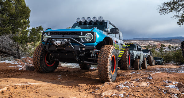 vehicles in the mud