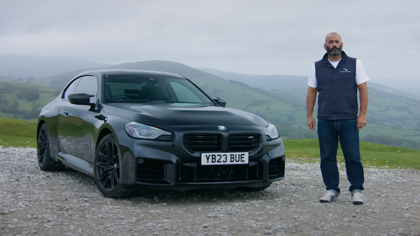 Chris Harris beside BMW M2